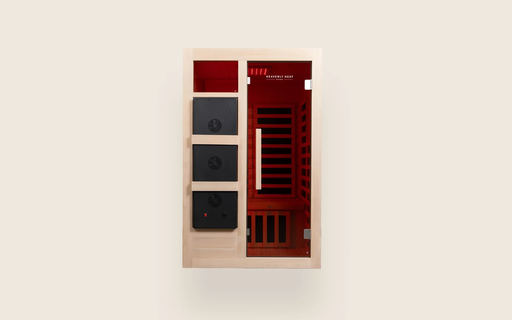 Heavenly Heat two person hemlock sauna glowing red through its tempered glass door